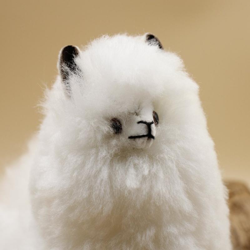 https://naturestreasuresatx.com/cdn/shop/files/Authentic-Hand-Made-Alpaca-Wool-Furry-Llamas-Natures-Treasures-3.jpg?v=1697033869