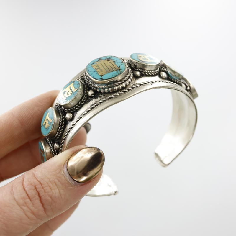 White Metal Tibetan Kalachakra w/ Reconstituted Turquoise Bracelet-Nature's Treasures