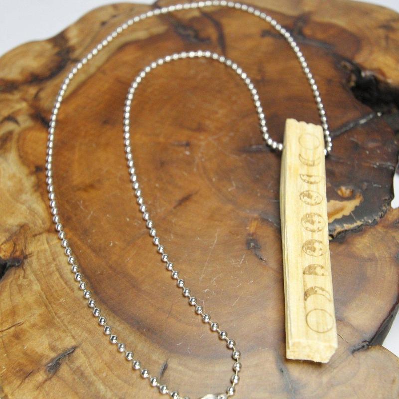 Moon Phase Carved Palo Santo Necklace