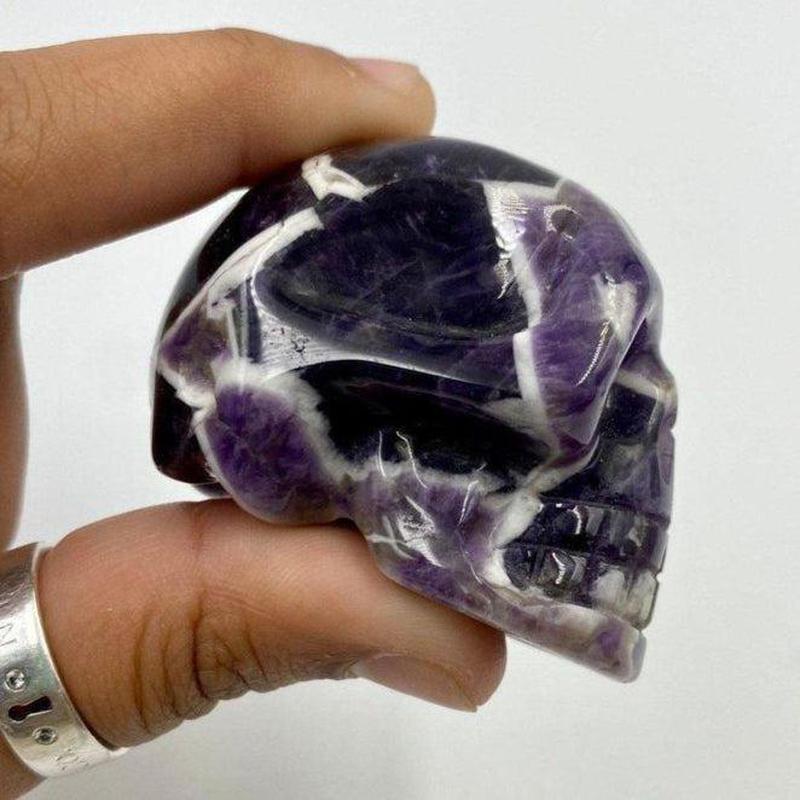 Polished Chevron Amethyst Skull Carvings || Brazil